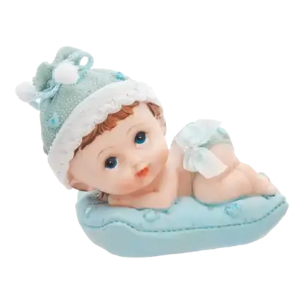 Baby Boy Figur auf einem blauen Kissen
