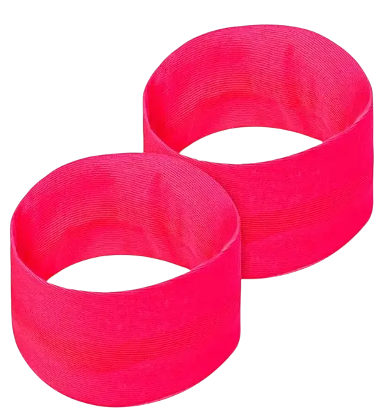 Paar neonpinkfarbene Manschetten